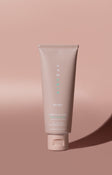 A tube of Pretty in Zinc SPF50+ Dreamscreen 30ml against a pink background.